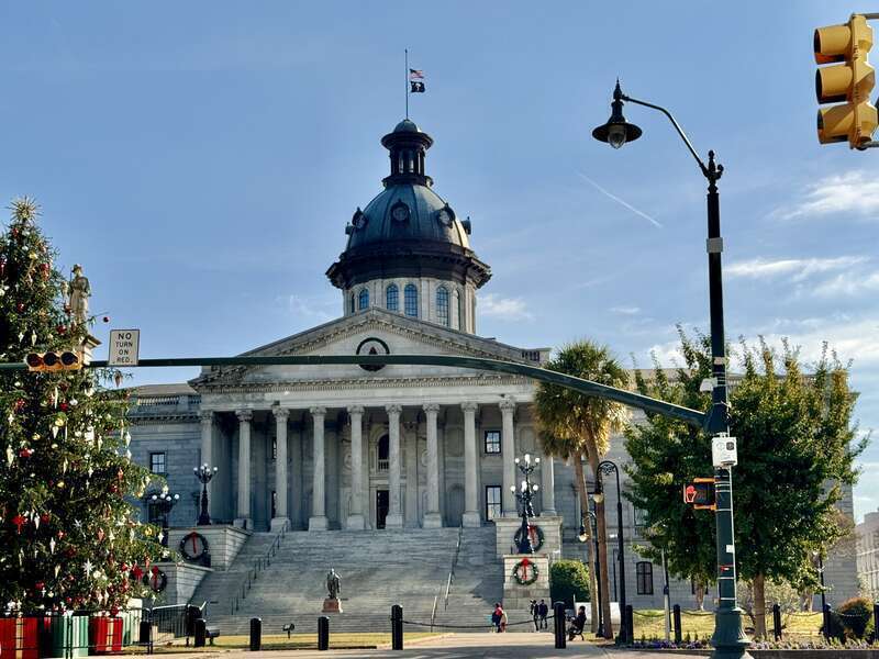 Built in 1851-1907, this Classical Revival-style building was designed by P. H. Hammarskold, John Niernsee, Frank McHenry Niernsee, Frank Pierce Milburn, and Charles Coker Wilson to serve as the state capitol building for South Carolina.  The