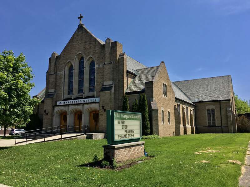 St. Margaret Roman Catholic Church, 1395 Hertel Avenue, Buffalo, New York, May 2020. The second Catholic parish to set up shop in the North Park area of the city, St. Margaret was founded in 1916 by Bishop Dennis Dougherty and named in honor of the