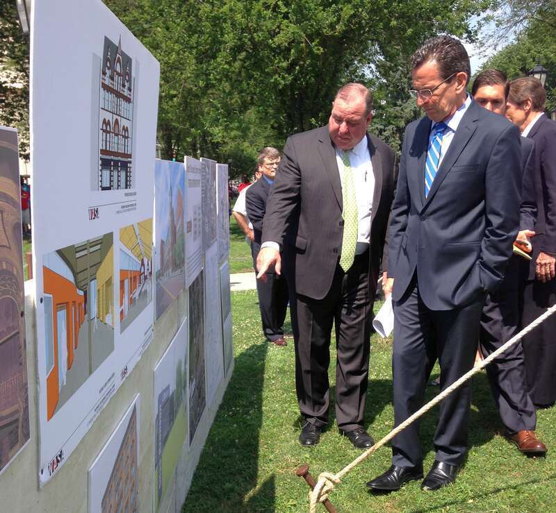 Monday, July 7, 2014 -- Governor Dannel P. Malloy, joined by Waterbury Mayor Neil M. O’Leary and other state and local officials, announced a $19.2 million package of state investment in six development and improvement projects in downtown Waterbury,
