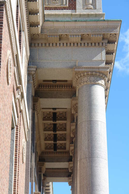 Terra cotta details on columns and portico.