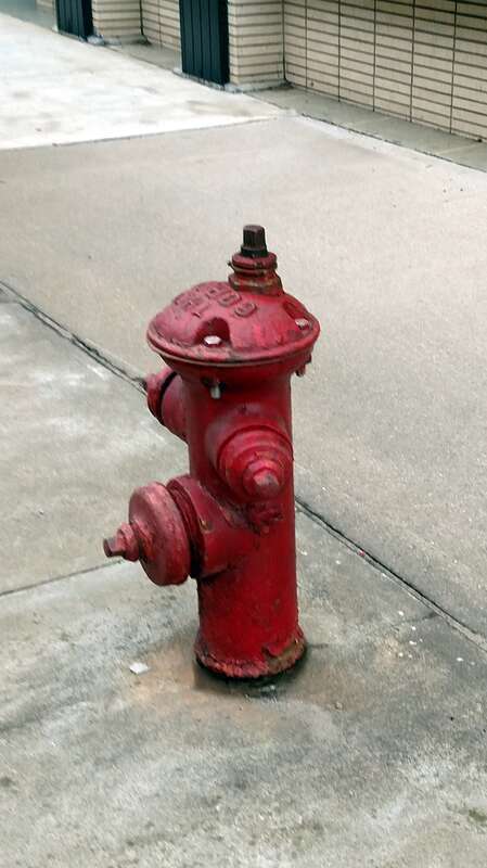 Old fire hydrant built by Rensselaer Valve Co. in downtown Jonesboro. The top says &quot;The Corey&quot;
