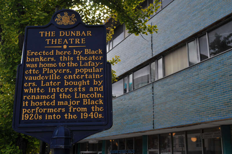 The Dunbar Theatre. Erected here by Black bankers, this theater was home to the Lafayette Players, popular vaudeville entertainers. Later bought by white interests and renamed the Lincoln, it hosted major Black performers from the 1920s into the