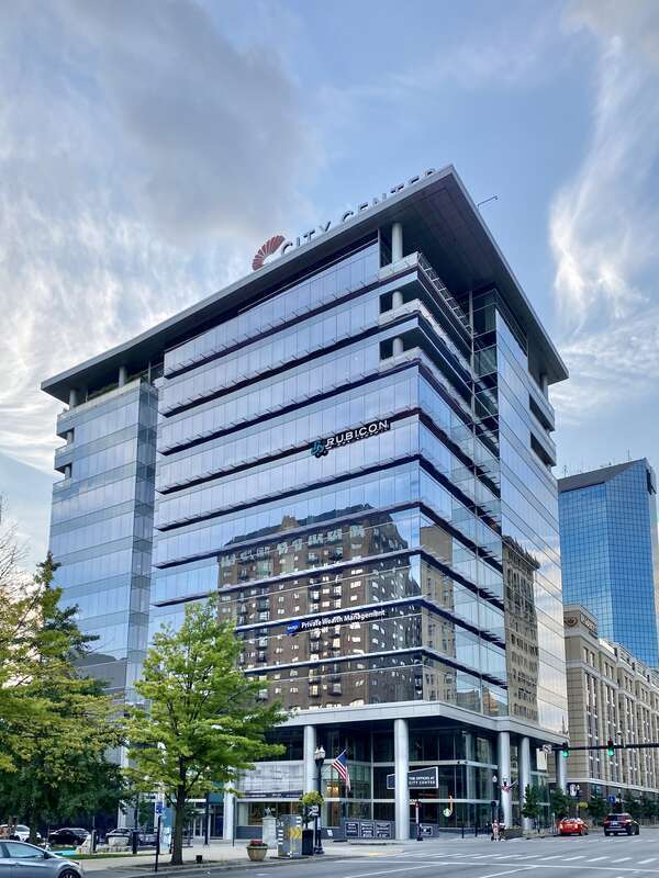 Built in 2019, this Contemporary mid-rise building was designed by Rabun Architects as a mixed-use office, retail, and hotel complex in Downtown Lexington.  The building features a glass-clad exterior with metal panel trim, large cylindrical