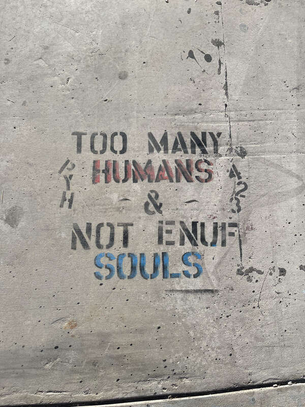 &quot;Too many humans &amp;amp; not enuf souls&quot; street art in Las Vegas, Nevada