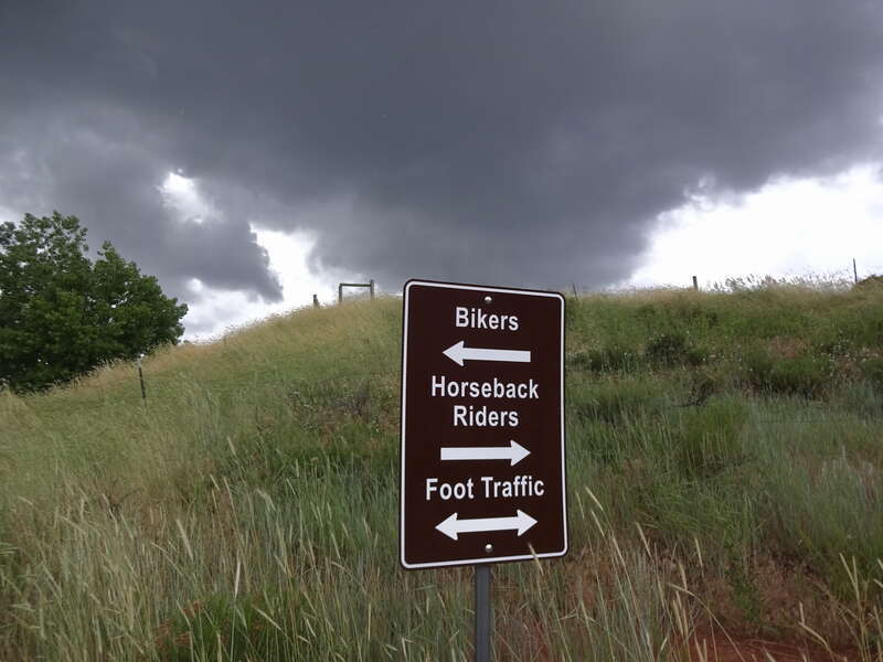 Trail sign at Devil's Back Bone Open Space indicating what type of use is allowed on the various trails that branch out from the junction where the sign is located.  Devil's Backbone Open Space is located in Larimer County, Colorado, US.