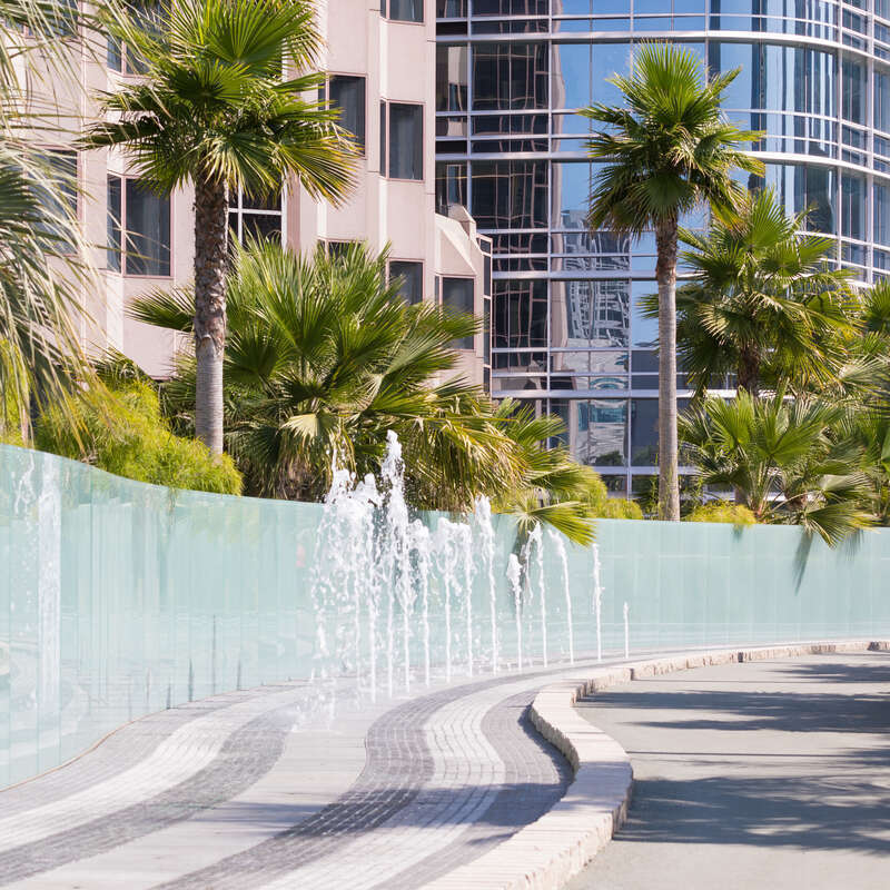 Transbay Transit Center in San Francisco, on the day after the opening: water jets on the rooftop of the transit station responding to the flow of buses on the deck below.