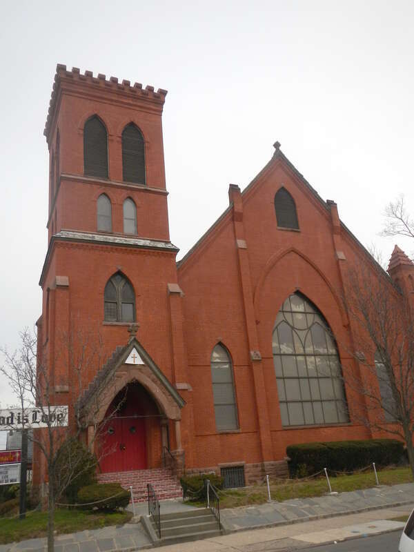 Looking east across East 2nd Avenue at Unity Baptist Tabernacle on a gloomy afternoon.