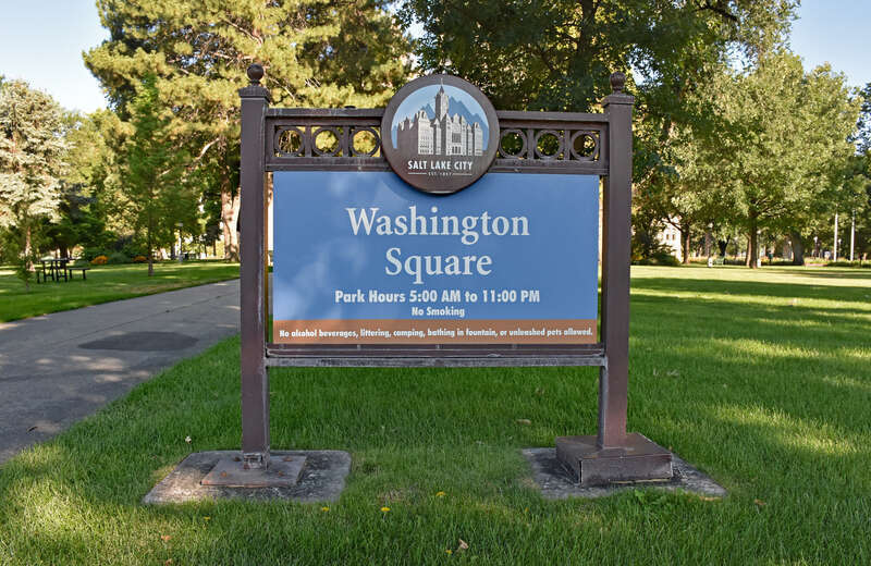 An entrance sign at the southeastern corner of Washington Square in Salt Lake City, Utah, as pictured in 2020.