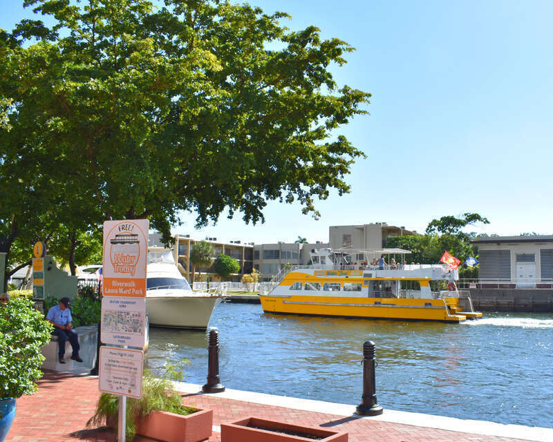 A water taxi passes Ellis Point along the Tarpon River in Fort Lauderdale, Florida.