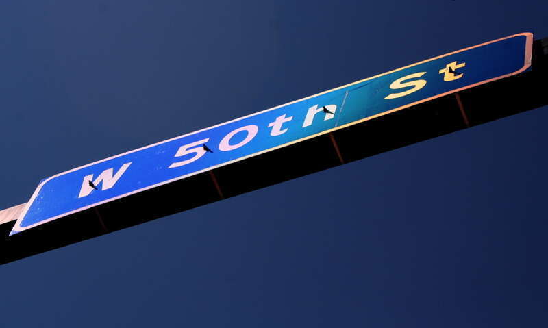 Street sign: &quot;W 50th St&quot; - Edina Art Fair 2006. 50th Street and France Avenue, borderline between Minneapolis and Edina, Minnesota.