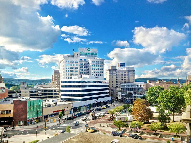 View of downtown Wilkes-Barre, Pennsylvania, with Public Square in the foreground and the mountains of the upper valley ridge in the background.