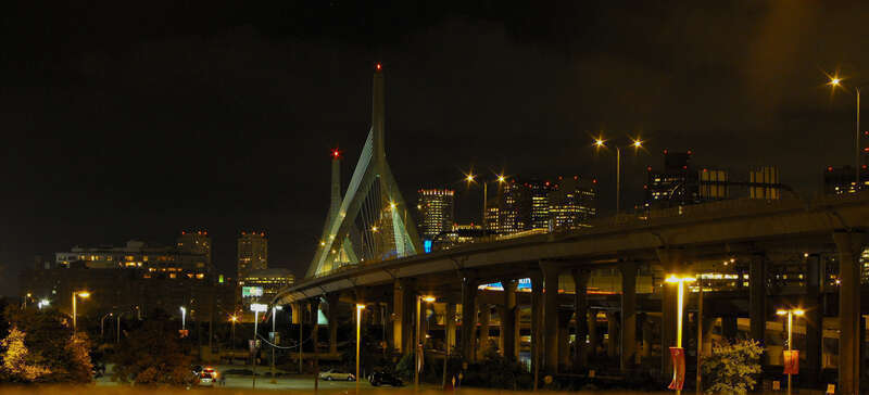 Photograph taken by me of the Leonard P. Zakim Bunker Hill Memorial Bridge at approximately 10:00 PM. Financial District/Downtown Boston, Massachusetts, USA in background