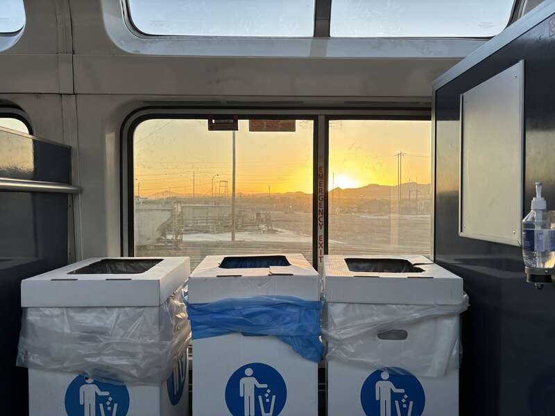 Waste receptacles at the center of a Superliner I Sightseer Lounge car on the Southwest Chief