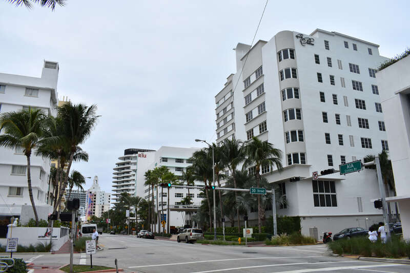 The Sea Isle Hotel (right), now the Palms, on Collins Avenue in Miami Beach, part of the Collins Waterfront Architectural District.