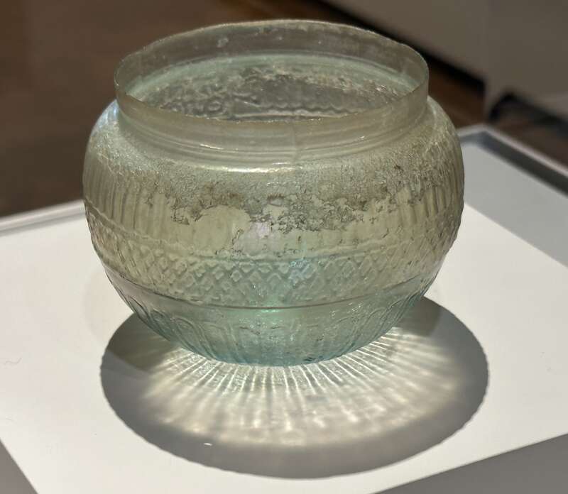 Mold-blown glass bowl by ancient Roman glassmaker Ennion, mid-1st century CE. Displayed at the Chrysler Museum of Art.