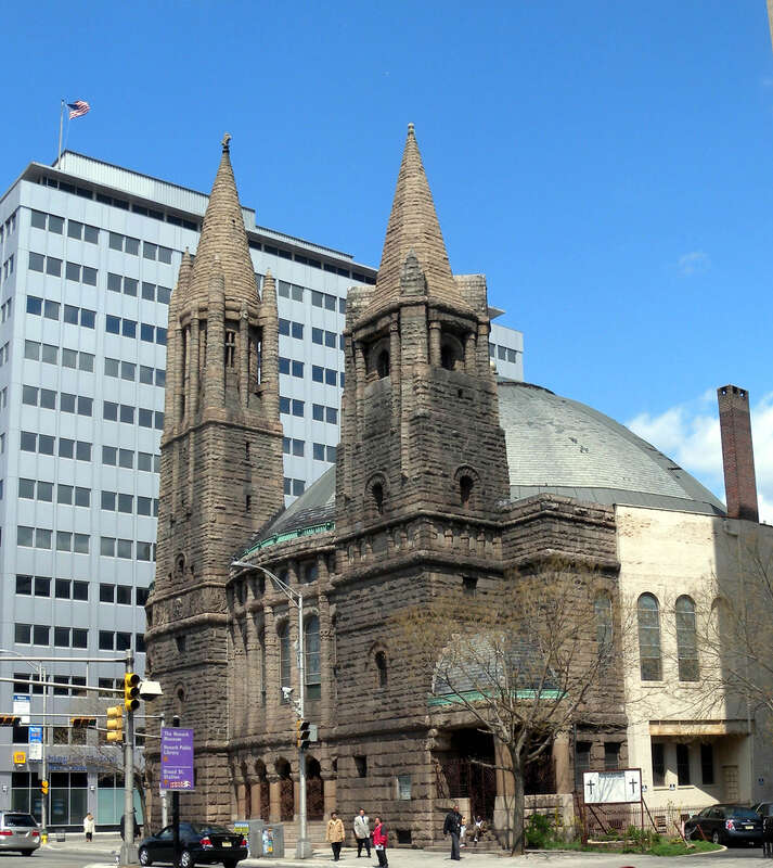 Looking northeast at First Baptist Peddie Memorial Baptist Church on a sunny midday. Architect: William Halsey Wood.
