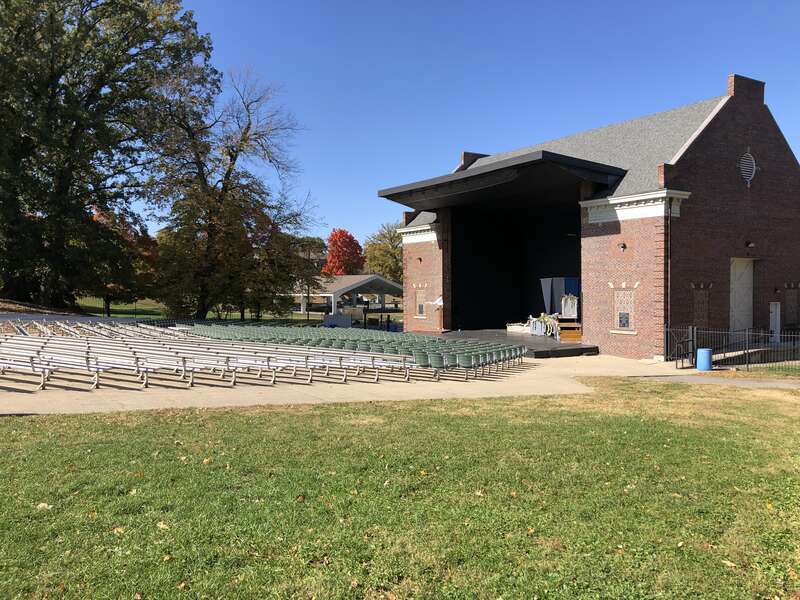 This image depicts the MacAllister Center for the Performing Arts at Garfield Park in Indianapolis, Indiana, U.S. The amphitheater was completed in 1922 and named after civic leader and philanthropist Pershing Edwin (P. E.) MacAllister in 1997.