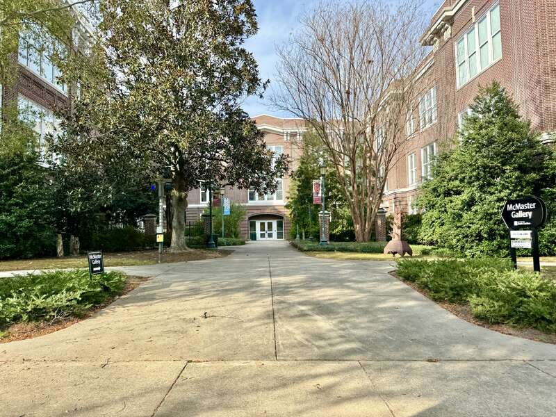 Built in 1911, this Classical Revival-style building was designed by Edwards and Walter to serve as the McMaster School, a segregated whites-only public school.  The building features a red brick exterior, a rusticated base, one-over-one windows, a
