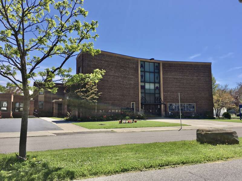 The St. Ambrose worship site of Our Lady of Charity RC Church, 65 Ridgewood Road, Buffalo, New York, May 2020. St. Ambrose was one of the last new Catholic parishes in Buffalo to be established (excepting those created during the late-2000s "Journey