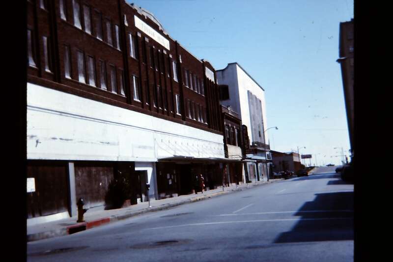 In 1975, the north side of the 400 block of Peoples St. was mostly boarded-up and abandoned.