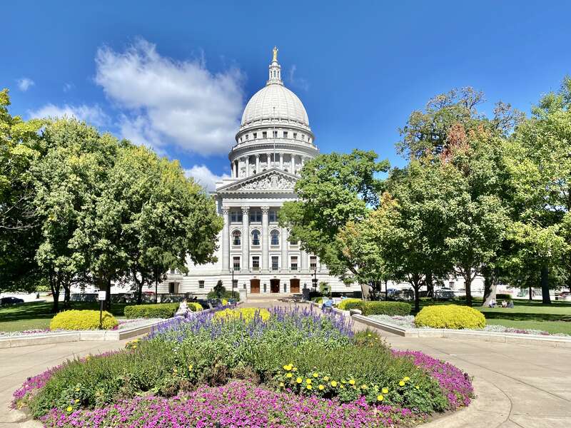 Built in 1906-1917, this Beaux Arts-style Capitol Building was designed by George B. Post to house the state house of representatives, state senate, and offices for the Wisconsin State Government.  The fourth state capitol to house the state