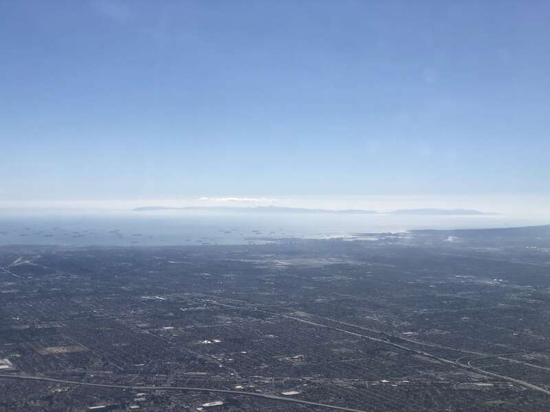 View southwest towards San Pedro Bay and the Port of Long Beach in southern Los Angeles County, California from an airplane heading toward Los Angeles International Airport