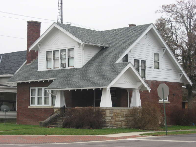 Front and northern side of the house located on the southwestern corner of the junction of Main Street (State Route 235) and Ballard Avenue in Ada, Ohio, United States.