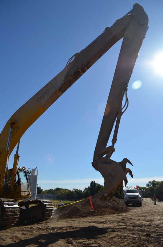 A custom-built excavator makes its way along the American River in Sacramento, Calif., Oct. 2, 2013. Crews are installing around 3,300 feet of seepage cutoff wall along the north bank of the American River in north Sacramento, Calif. Completion is