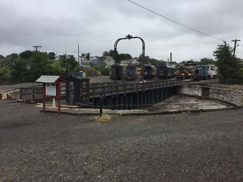 The turntable in the railway yard was used to turn the steam engines around, or allow them into the maintenance building.  It was built around 1914.