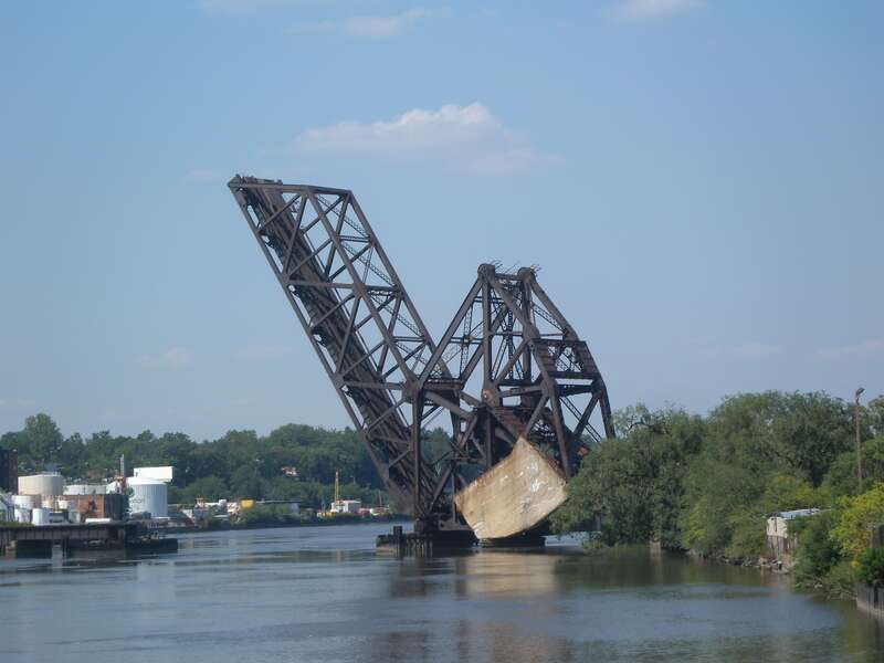 Looking north from eastern (East Newark) part of Clay St Bridge at former E-L rail bridge on a sunny midday.