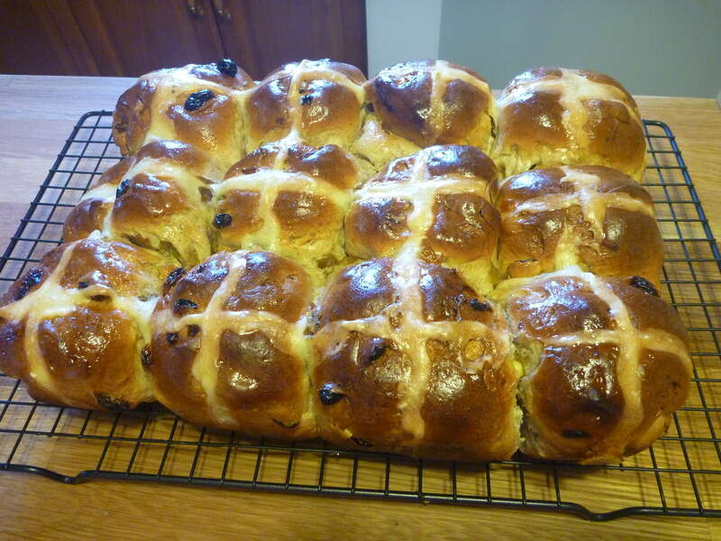 Hot Cross Buns on a wire rack.