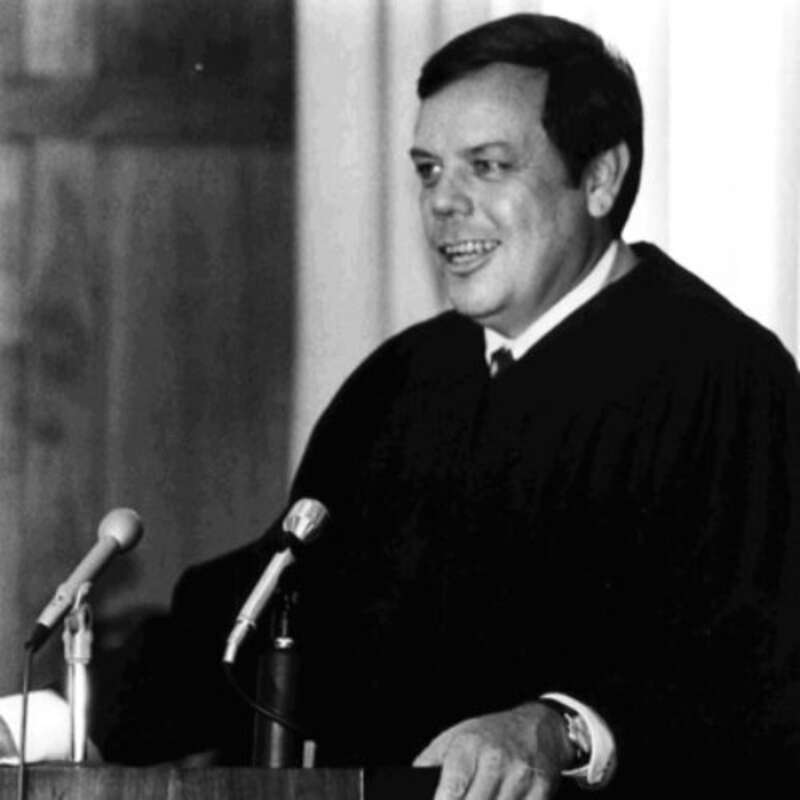 A photograph taken of Judge William Overton residing over his courtroom during the famous McLean v. Arkansas Board of Education trial. Here, he is seen interjecting during the case with a question.