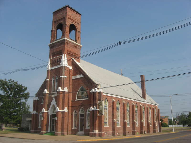 Western side and front of Liberty Missionary Baptist Church, located at 701 Oak Street in Evansville, Indiana, United States.  Built in 1886, it is listed on the National Register of Historic Places.