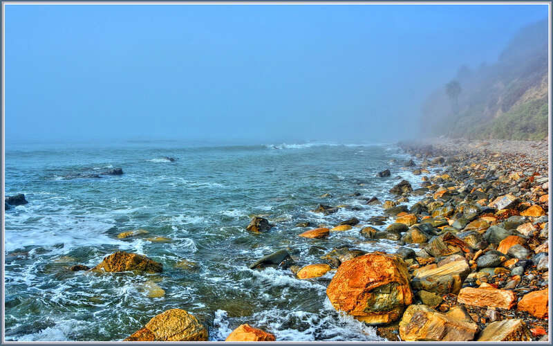500px provided description: Morning walk in Palos Verdes. [#mist ,#fog ,#morning ,#water ,#cold ,#blue ,#ocean ,#rocks ,#california ,#pacific]
