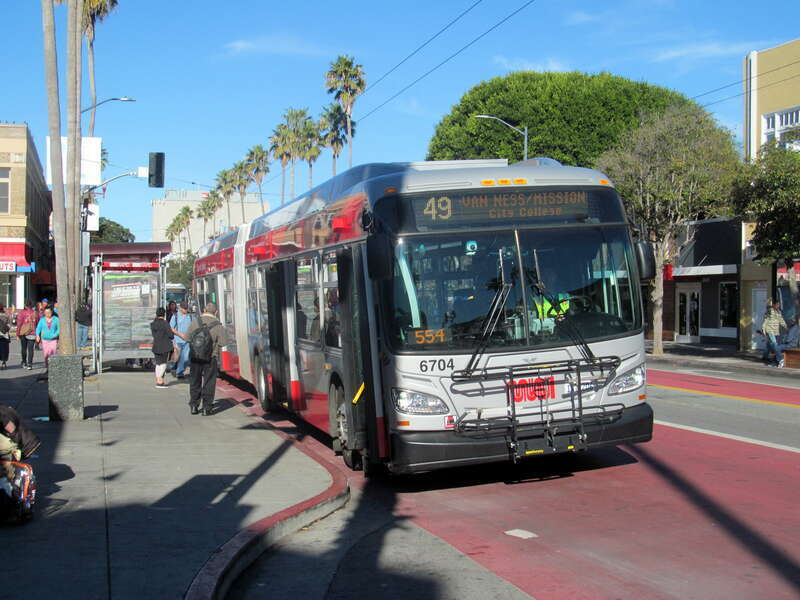 Muni route 49 bus at 24th Street Mission station in December 2017