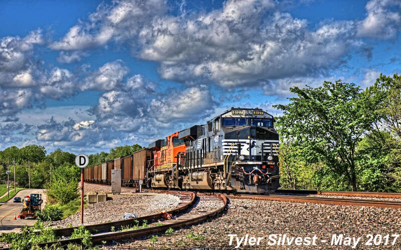 Norfolk Southern 8127(ES44AC), Burlington Northern Santa Fe 5922(ES44AC), Norfolk Southern 1094(SD70ACe) and Burlington Northern Santa Fe 9244(SD70ACe) Leads a Coal Drag Southbound on the BNSF Fort Scott Sub Parked because of Flooding in southern