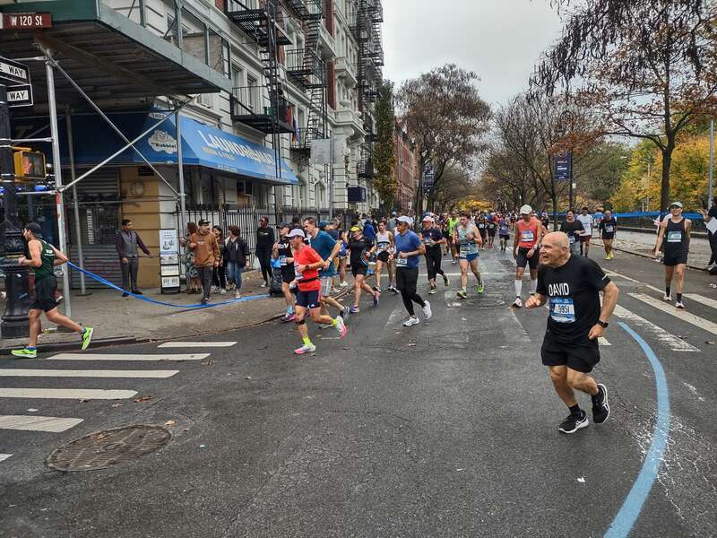 Looking west from 5th Avenue at thundering herd along 120th street