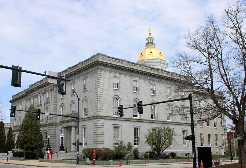 Rear and side elevations of the New Hampshire State House from Capitol Street in Concord.