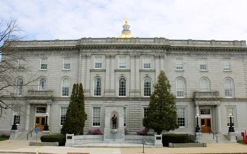 Rear elevation of the New Hampshire State House from Capitol Street in Concord.