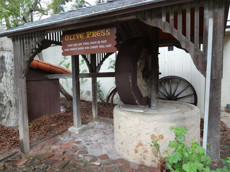 Olive press in Mission San Buenaventura courtyard