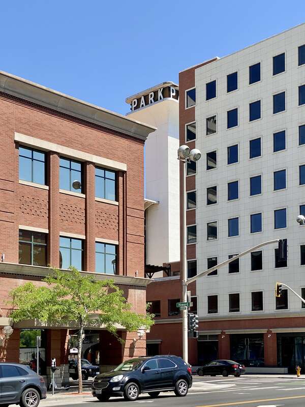 Built in 1967, this Brutalist building was designed by Warren C. Heylman to serve as a parking garage, known as Parkade Plaza.  The building features a concrete structure, exterior fins with flared brackets at the cornice, vaulted ceilings below the