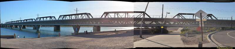 The bridge is for trains and it spans Tempe Town Lake