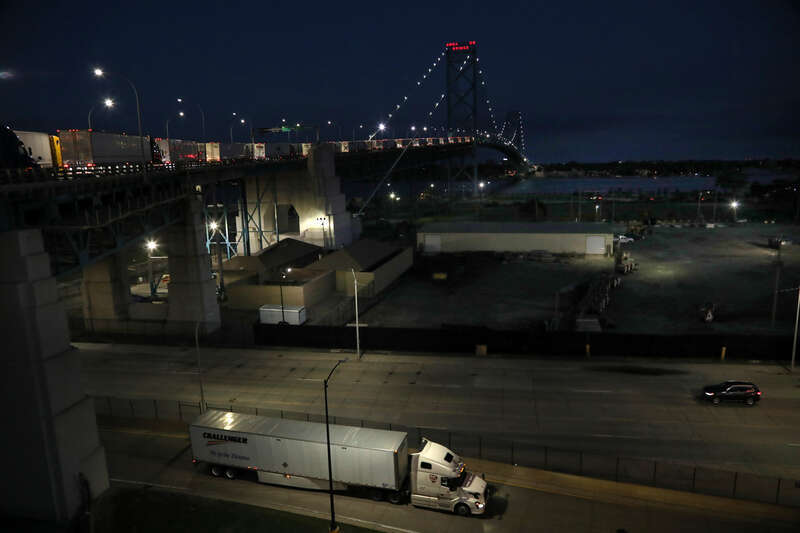 The Ambassador Bridge at dusk with cargo traffic. The Ambassador Bridge connects Detroit, Mich. and Windsor, On, and is the busiest international crossing in North America. August 26, 2022
Photo by Charles Csavossy