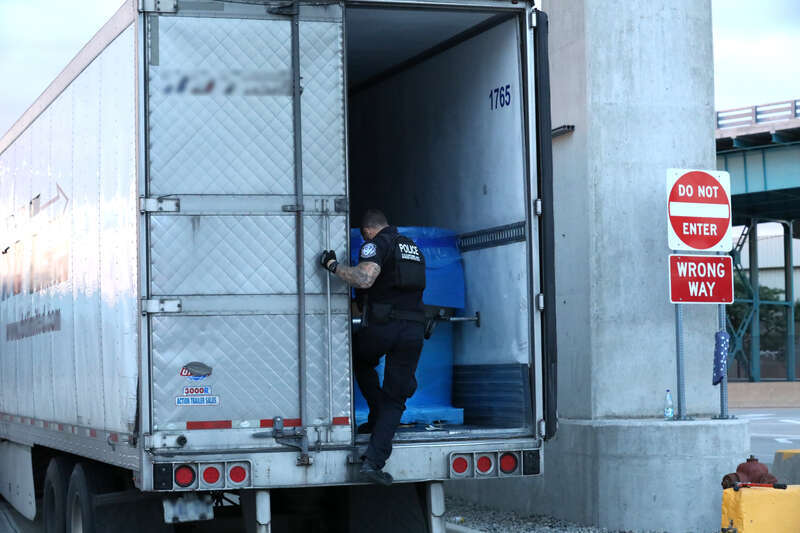 U.S. Customs and Border Protection Officers conduct outbound inspections at the Fort Street Port of Entry at the Ambassador Bridge. The Ambassador Bridge connects Detroit, Mich. and Windsor, On, and is the busiest international crossing in North