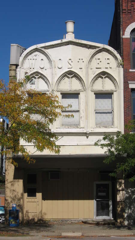 Front of the Wooster Block, located at 529 Broad Street in Elyria, Ohio, United States.  Built in 1870, it is listed on the National Register of Historic Places, and it is part of a Register-listed historic district, the Elyria Downtown-West Avenue