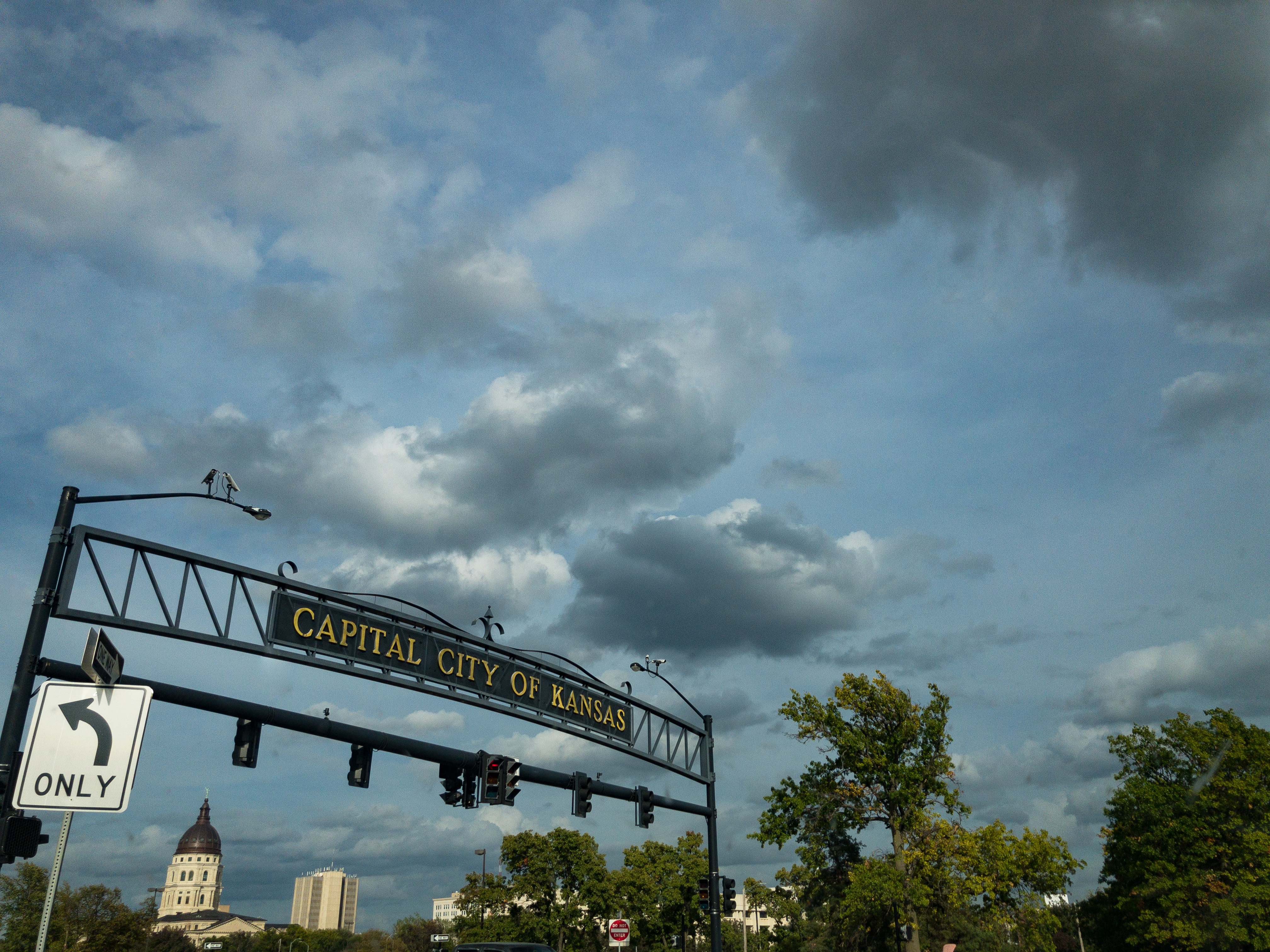 Signage in Topeka, Kansas reads &quot;Capital City of Kansas&quot; with surveillance cameras on it.