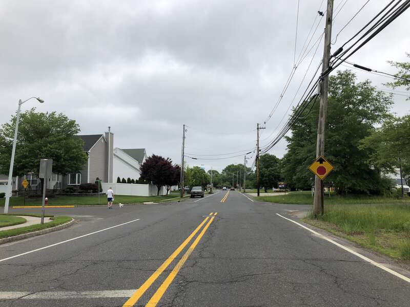 View north along Monmouth County Route 527 Alternate (Main Street) at Woodruff Court in Englishtown, Monmouth County, New Jersey