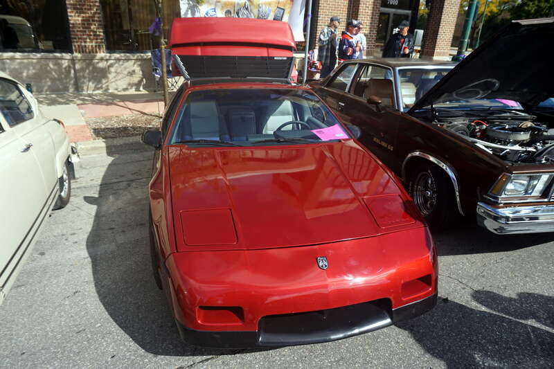 A 1987 Pontiac Fiero SE on display at the 2022 Downtown West Allis Classic Car Show in West Allis, Wisconsin (United States).