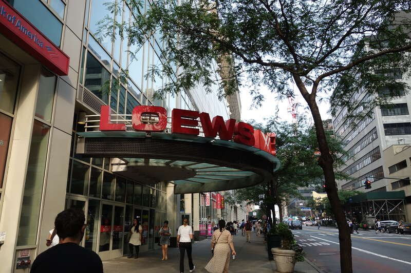 The Loews cinema at the north end of the Olivia apartment building (315 West 33rd Street) on the south side of 34th Street between 8th and 9th Avenues in the Garment District, Midtown Manhattan. The cinema has since been rebranded as an AMC theater.