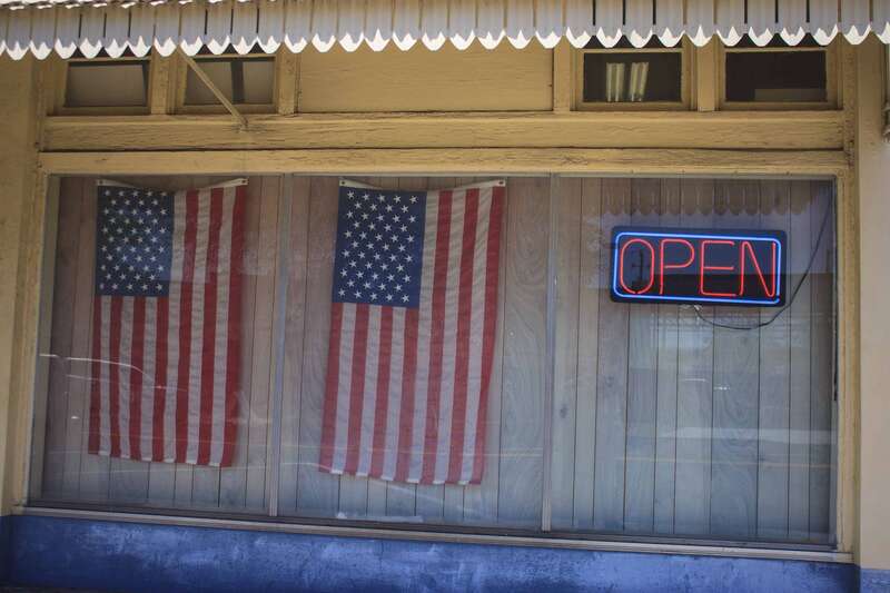The US flag in a shop window in St. Petersburg, Florida